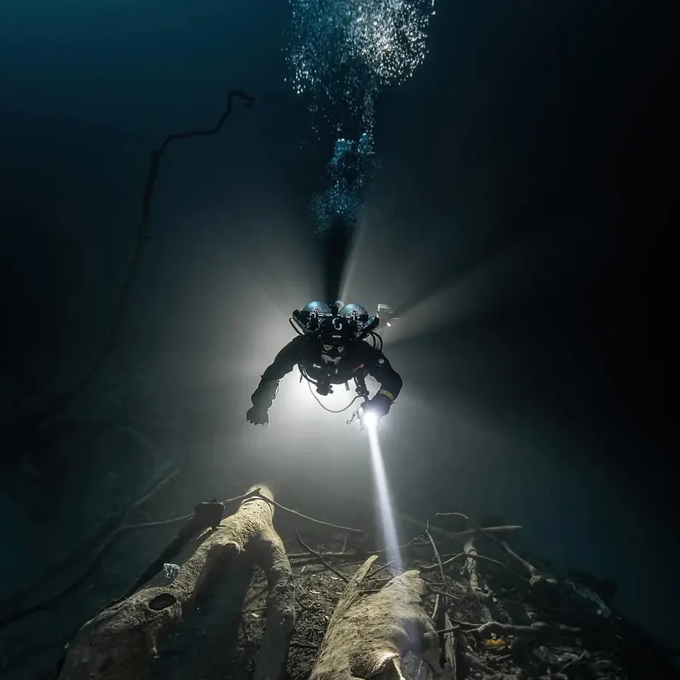 Divers gearing up at the edge of Cenote Angelita