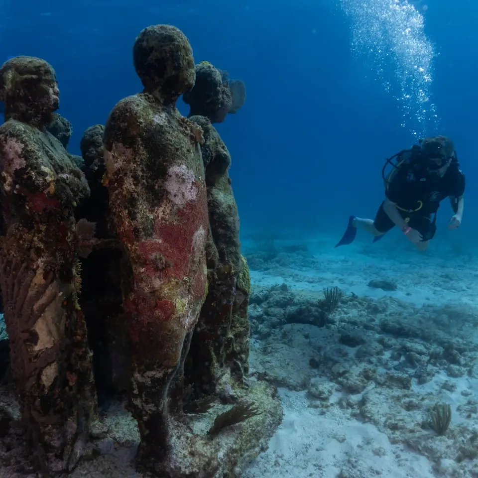 Submerged sculpture of the MUSA underwater museum off Cancun