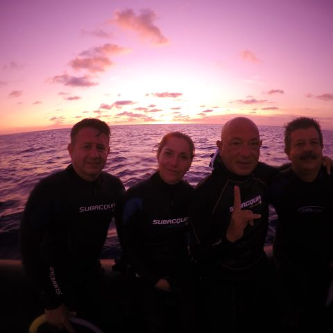 a group of people posing for the camera